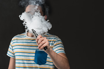 Image showing The face of vaping young man