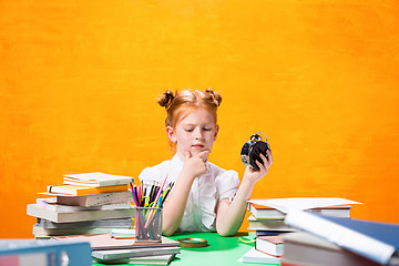 Image showing Teen girl with lot of books