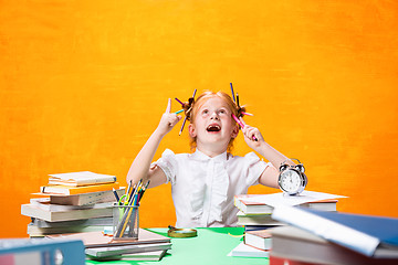 Image showing Teen girl with lot of books