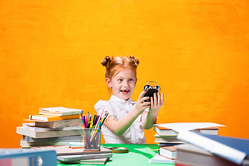 Image showing Teen girl with lot of books