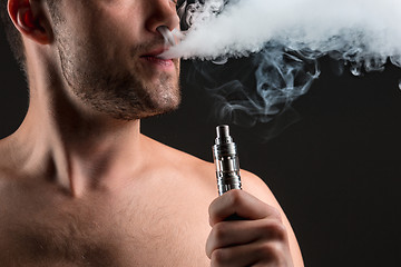 Image showing The face of vaping young man