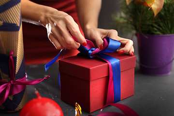 Image showing Christmas gift idea how to decorate a gift Beautifully wrapped gift