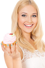 Image showing Woman eating sweet cake