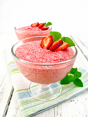 Image showing Jelly air strawberry with mint in bowl on board