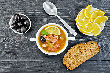 Image showing Solyanka in bowl on black board top