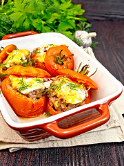 Image showing Tomatoes stuffed with rice and meat in brown brazier
