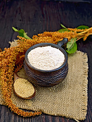 Image showing Flour amaranth in clay cup with flower on board