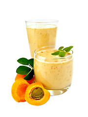 Image showing Milkshake apricot in two glasses