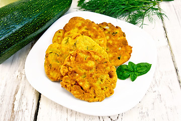 Image showing Flapjack chickpeas with zucchini in plate on board