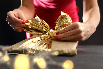 Image showing Christmas gift idea how to decorate a gift Beautifully wrapped gift