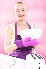 Image showing Woman in the kitchen.  Joyful cooking . Kitchen fashion .