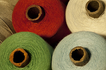 Image showing  colorful tailor thread on bobbins