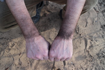 Image showing  working hands of chimney-sweeper