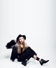 Image showing young blonde teenage girl in hat and fur coat, fashion dressed m