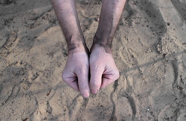 Image showing  hands of the miner 