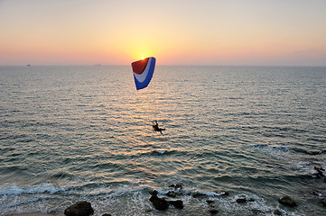 Image showing Powered paraglider flying
