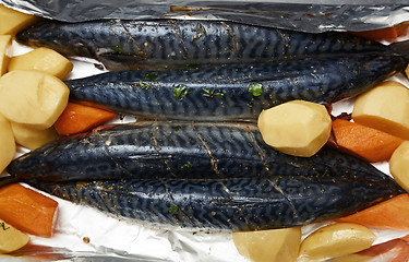 Image showing Fish with potato and carrot ready to be cooked