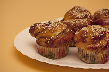 Image showing  Ruddy cakes with sesame seeds 