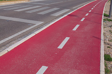 Image showing Red bicycle path