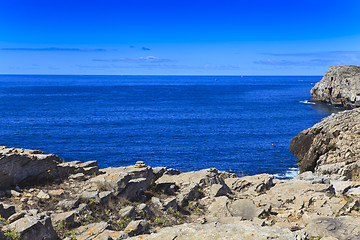 Image showing Rocky Coast Extending into the Sea