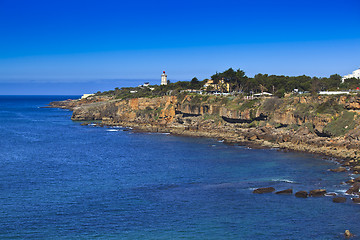 Image showing Rocky Coast Extending into the Sea