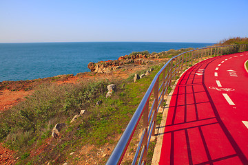 Image showing Red bicycle path