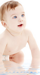 Image showing portrait of crawling baby boy looking up