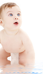 Image showing portrait of crawling baby boy looking up