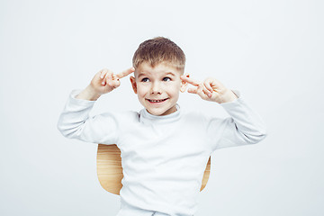 Image showing little cute adorable boy posing gesturing cheerful on white background, lifestyle people concept