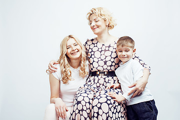 Image showing happy smiling family together posing cheerful on white background, lifestyle people concept, mother with son and teenage daughter isolated closeup
