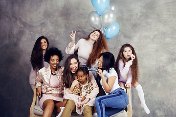 Image showing Lifestyle and people concept: young pretty diversity nations woman with different age children celebrating on birth day party together happy smiling, making selfie. African-american, asian and caucasi