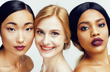 Image showing  different nation woman: asian, african-american, caucasian together isolated on white background happy smiling, diverse type on skin, lifestyle people concept 