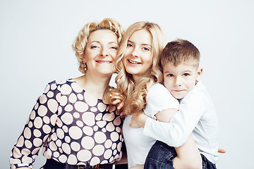 Image showing happy smiling family together posing cheerful on white background, lifestyle people concept, mother with son and teenage daughter isolated