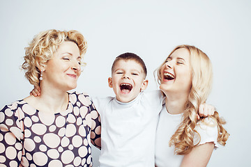 Image showing happy smiling family together posing cheerful on white background, lifestyle people concept, mother with son and teenage daughter isolated