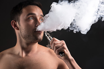 Image showing The face of vaping young man