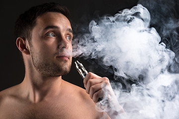 Image showing The face of vaping young man