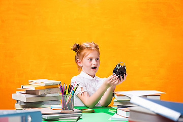 Image showing Teen girl with lot of books