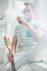 Image showing The face of vaping young man