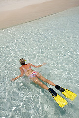 Image showing Woman snorkelling in tropical water