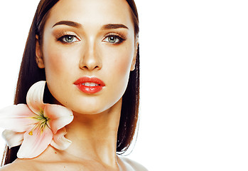 Image showing young attractive lady close up with hands on face isolated flowe