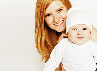 Image showing young beauty mother with baby, red head happy family isolated cl