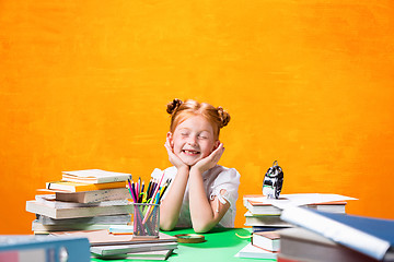 Image showing Teen girl with lot of books