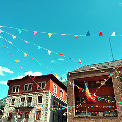 Image showing Street of Andorra La Vella decorated with colorful pennants
