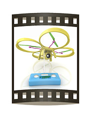 Image showing Drone with remote controller. The film strip