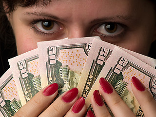 Image showing lady with dollar feather