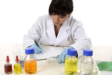 Image showing Scientist documenting results