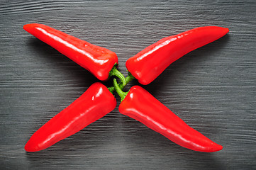 Image showing Sweet red Kapia peppers on a dark shale