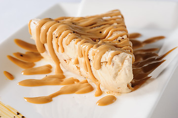 Image showing Delicious cheesecake with caramel topping