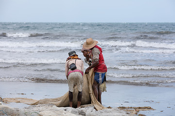 Image showing Native Malagasy fishermen fishing on sea, Madagascar