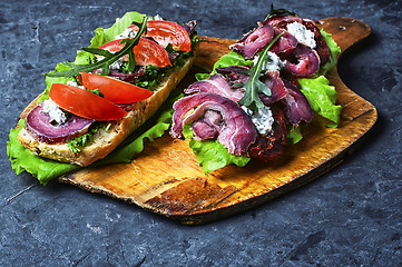 Image showing Baguette with bacon and vegetables